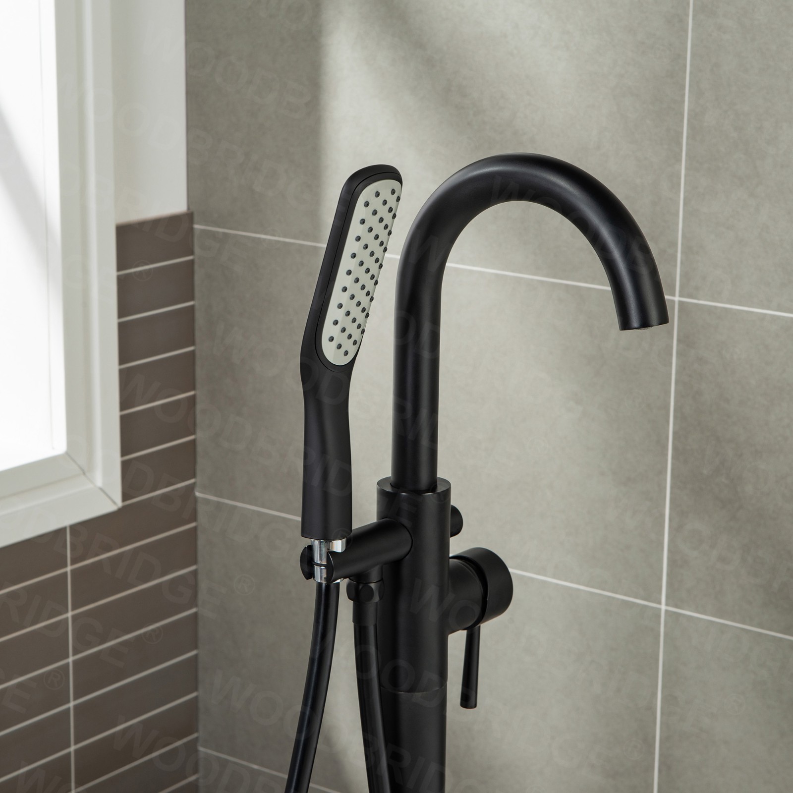  WOODBRIDGE F0025MBSQ Fusion Single Handle Floor Mount Freestanding Tub Filler Faucet with Square Comfort Grip Hand Shower in Matte Black Finish._5272