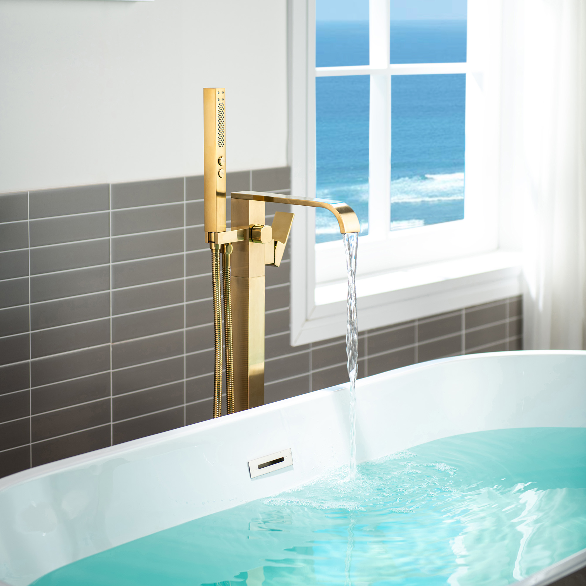  WOODBRIDGE F0039BG Contemporary Single Handle Floor Mount Freestanding Tub Filler Faucet with Hand shower in Brushed Gold Finish._12212