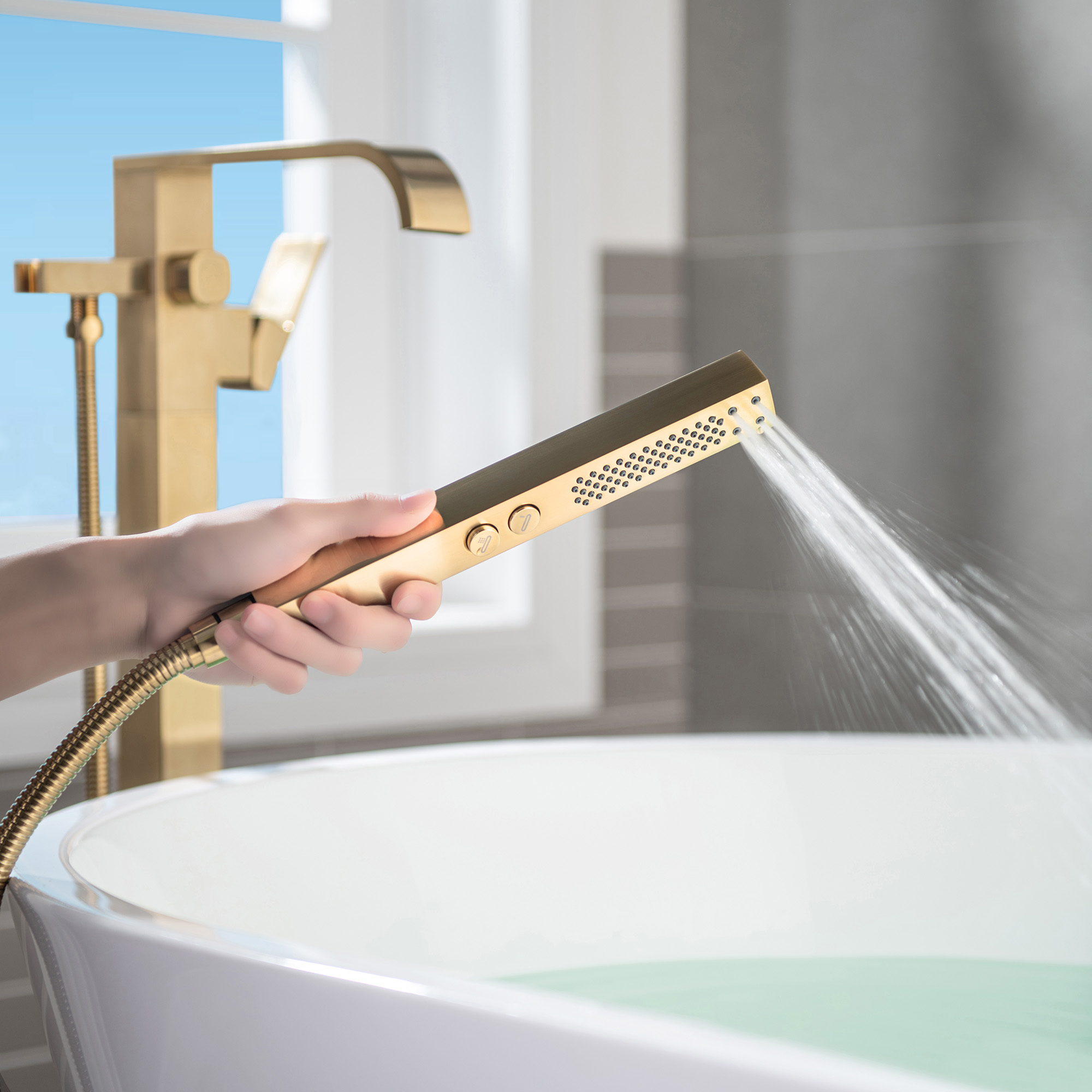  WOODBRIDGE F0039BG Contemporary Single Handle Floor Mount Freestanding Tub Filler Faucet with Hand shower in Brushed Gold Finish._12213