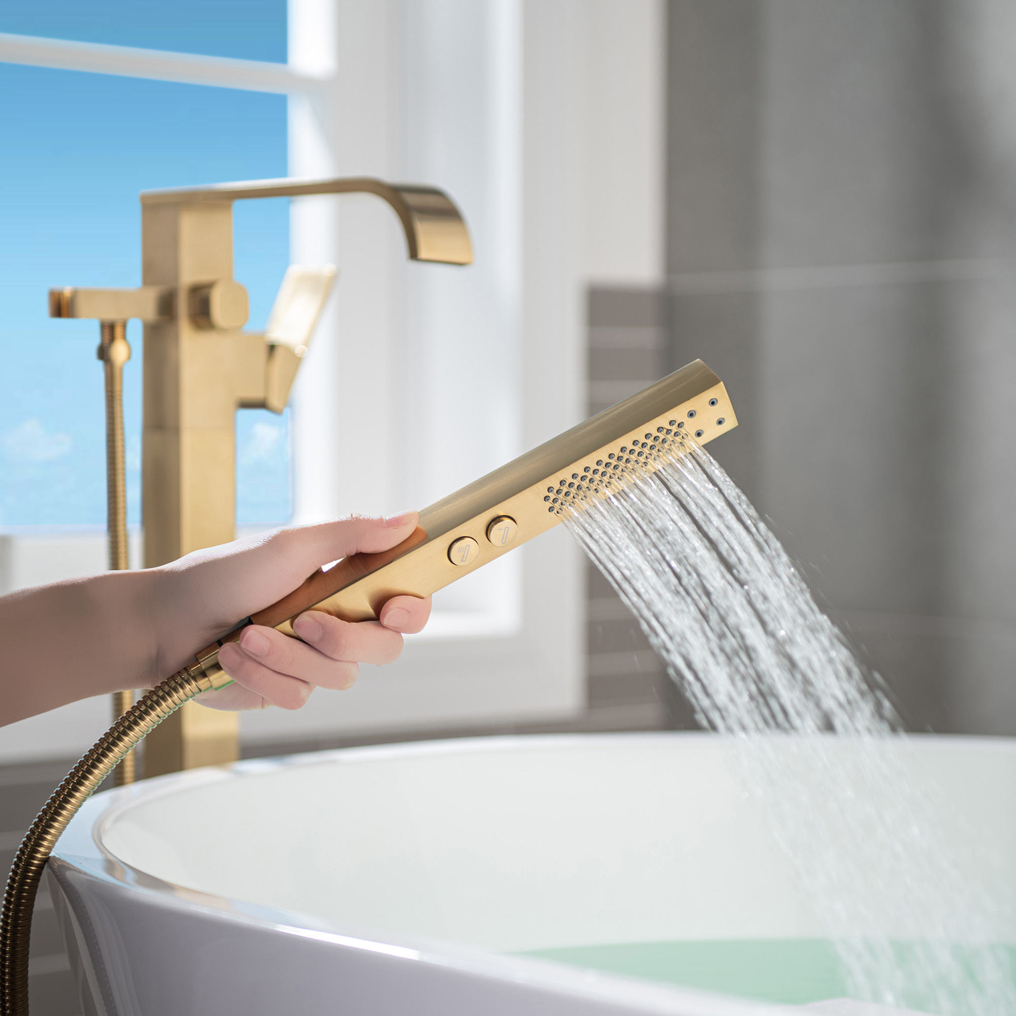  WOODBRIDGE F0039BG Contemporary Single Handle Floor Mount Freestanding Tub Filler Faucet with Hand shower in Brushed Gold Finish._12214
