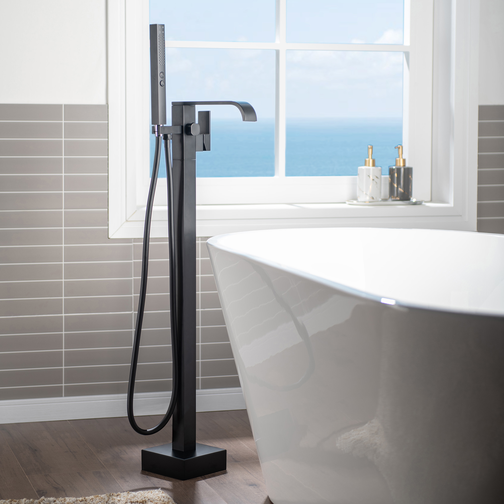 WOODBRIDGE F0037MB Contemporary Single Handle Floor Mount Freestanding Tub Filler Faucet with Hand shower in Matte Black Finish.